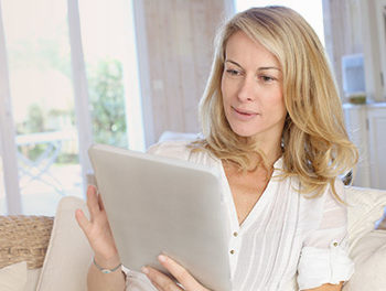 attractive older woman on her ipad