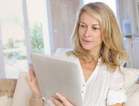 Lady using iPad for internet dating