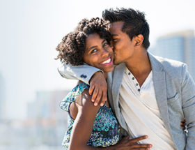 woman laughing after romantic surprise