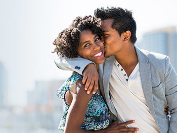 woman laughing after romantic surprise