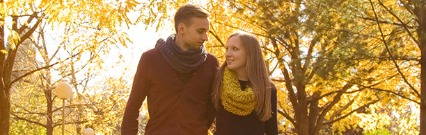 happy couple in autumn park 