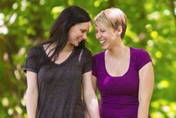 two women smiling together