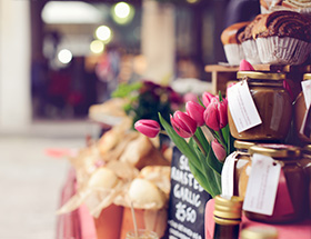 Market stall with tulips and muffins