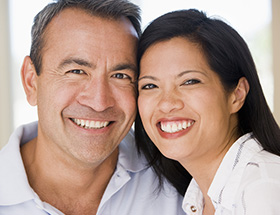 asian couple smiling
