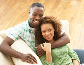 Attractive black couple smiling