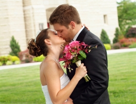 married couple kissing