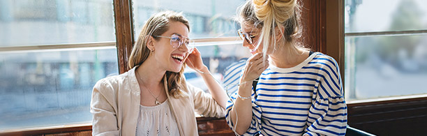 lesbian couple listening to music