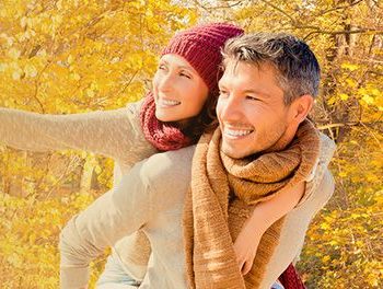 couple smiling in autumn