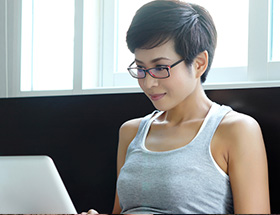 Asian girl on computer