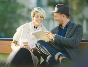 Man and woman on a bench in London