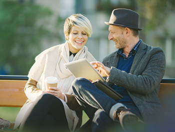 Man and woman on a bench in London