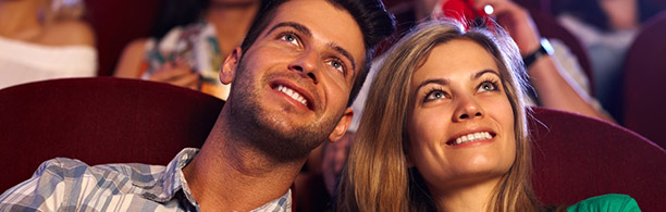 man and woman at the cinema together