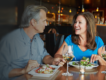 man enthralled by woman asking great first date questions