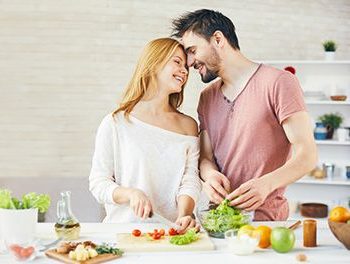 couple cooking together